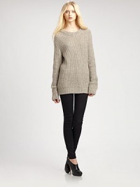 Crafted with a boyfriend fit and touch of plush mohair, this pared-back crewneck has ribbed trim and hits below the hips. Ribbed crewneckDropped shouldersLong sleevesRibbed cuffs and hemLonger length hits below the hips43% wool/25% nylon/20% acrylic/12% mohairDry cleanImportedModel shown is 5'9½ (176cm) wearing US size Small.