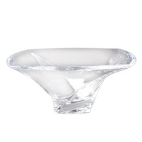 Exuding the grace of a ballet dancer, the Piroett Bowl brims with artistic flair. Artist Lisa Smith designed the full-lead crystal piece with a square rim and undercut sides that seem to be unfurling as they spin up and off the heavy, square base.