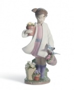 Grow your Lladro collection with the charming Delicate Nature figurine. A young girl gets to work outside, potting plants and feeding the birds.