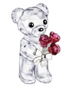 Already irresistible in faceted Swarovski crystal, this Kris Bear figurine extends a bouquet of red roses that'll win anyone's heart.