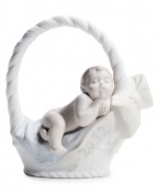 A little basket of joy. Moms and dads will cherish this beautiful Lladro figurine celebrating the birth of their baby boy in fine porcelain.