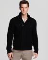 When the cold weather strikes, reach for this warm, chunky waffle knit cardigan embellished with a unique, asymmetrical covered zip placket. Rendered completely in merino wool for superior softness.