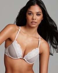 Calvin Klein's racerback bra with mesh overly cups provides a flattering shape and stylish silhouette.