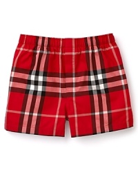 Hidden elastic waist band boxers with all over check pattern. One button fly.