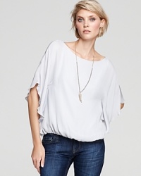 Spread your wings in this ethereal-looking Alice + Olivia top--in pure silk with stylish dolman sleeves for a more dramatic silhouette.