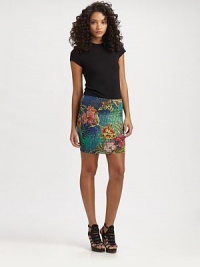 Ultra-fitted mini skirt in an animal-inspired tropical print. Elastic waistbandAbout 16 long92% modal/8% spandexMachine washImportedModel shown is 5'10 (177cm) wearing US size Small.