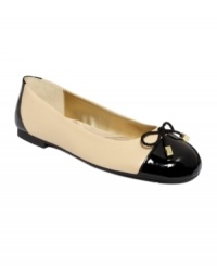 Refined elegance. Tahari's Collins ballet flats feature a cute and trendy cap toe.