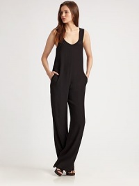 Trend-forward jumpsuit fashioned with a plunging scoopneck, slash pockets and an unexpected scoopback. Plunging scoopneckWide strapsSlash pocketsLow scoopbackInseam, about 35ViscoseDry cleanImported of Italian fabricModel shown is 5'11 (180cm) wearing US size Small.