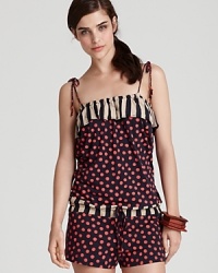 Ondademar's drawstring romper is destined to be spotted. Ideal post plunge, this printed playsuit hints at graphic chic.