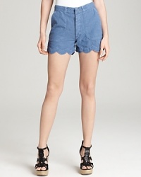 A scalloped hem brings ladylike allure to these easy-breezy MiH shorts.