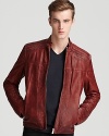 In tanned calfskin leather, the Larkus jacket lends a modern look with stitched details and side buckles.