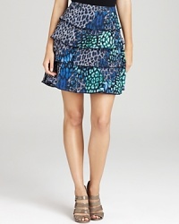 An electric palette enlivens a leopard-print VINCE CAMUTO skirt for a vibrant walk on the wild side. Play up the tiered silhouette with strappy sandals for a roaring fashion statement.