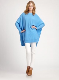 Refined wool-rich sweater in a poncho silhouette with long dolman sleeves and a touch of cashmere. BoatneckLong dolman sleevesPullover styleRibbed asymmetrical hemAbout 33 from shoulder to hemWool/viscose/polyamide/cashmere/angoraDry cleanImportedModel shown is 5'10 (177cm) wearing US size XSmall / Small. 