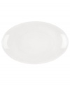 A modern balance. Create a sense of effortless urban luxury with the Matte & Shine platter, featuring a minimalist coupe shape, white glaze and tonal banding by Donna Karan Lenox.