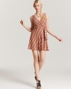 This boldly striped Bailey 44 dress cuts an ultra-flattering silhouette with a chic wrap design.