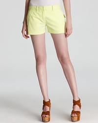 Yellow neon Theory shorts lend sunny style to your every day. Layered over a itty-bitty bikini or teamed with your favorite tee, these rockin' minis make the most of summer.