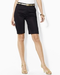 Rendered in sleek stretch twill, the Hulday Bermuda shorts are a sophisticated warm weather staple.