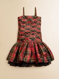 Inspired by vintage Americana, this pretty tartan plaid design features ruching and a full tulle skirt for a stylish silhouette.Straight necklineSpaghetti strapsInvisible side zipperDrop-waistRuffled skirt with exposed petticoatFully linedSilkDry cleanImportedNecklace shown not sold