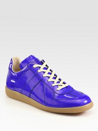 High-gloss, coated leather lace-ups make a statement.Lace-up frontLeather liningPadded insoleRubber soleMade in Italy