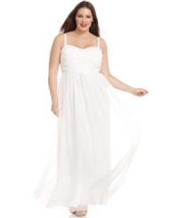 This elegant plus size evening gown by Adrianna Papell features a beautiful sweetheart neckline and a rosette applique at the bust. The ribbon tie at the waist and flowing chiffon skirt are sweet touches.