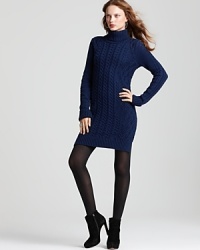 Show off your stems in this BCBGMAXAZRIA cabled sweater mini dress with semi sheer tights and soaring booties.