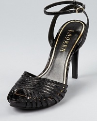 A strappy, snakeskin embossed silhouette from Lauren Ralph Lauren lends itself to daytime and after-hours alike.