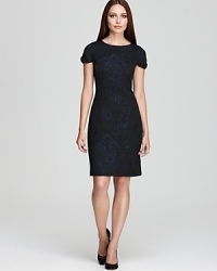 Patterned jacquard takes a sophisticated form in dark, classic hues on this smart Elie Tahari dress.