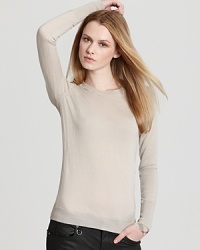 Rendered in sumptuous merino wool, this Burberry Brit sweater touts a clean silhouette and check-lined cuffs for an endlessly chic, yet cozy, style essential.