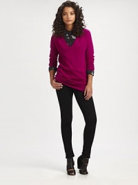 Pure cashmere sweater in a menswear-inspired silhouette with a plunging v-neck, dropped shoulders and long dolman sleeves. Ribbed v-neckDropped shouldersDolman sleevesRibbed cuffs and hemLonger length hits below the hipsAbout 30 from shoulder to hemCashmereDry cleanImportedModel shown is 5'10 (177cm) wearing US size Small.