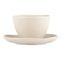 Featuring an organic shape and a matte glaze finish, this bowl and saucer are thoroughly modern and impart natural sophistication.