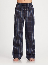 Woven pant features classic styling and modern, eye-catching check pattern.Elastic drawstring waistInseam, about 32CottonMachine washImported