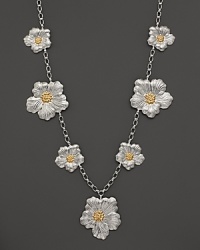 Delicate gardenias, captured at the height of their beauty in sterling silver and 18K yellow gold, bloom on this necklace from Buccellati.