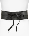 Finish flouncy dresses and pleated skirts with this stunning Eileen Fisher belt.