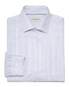 A well-dressed man can never have too many dress shirts. This Burberry shirt in a crisp cotton features a small check print and merges comfort and style with the perfect regular fit.