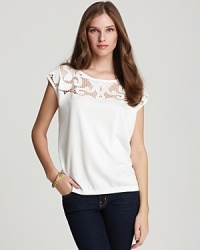 Wear this DKNYC crochet shoulder sweater over a cami, or sport it atop a strappy sundress for a warm-weather layered look.