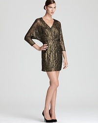 Dolman sleeves lend a laid-back look to a shimmering lace Trina Turk dress.