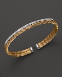 Charriol's classic two-tone Nautical Cable bangle lends a timeless look, luxe with diamond details.