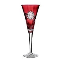 Waterford Snowflake Wishes, a new series of collectible giftware, celebrates nature's most beautiful and amazing feat of engineering -- the snowflake -- in a delightful 10 year series. This premier edition, Wishes for Joy, features fanciful snowflakes on a ruby-hued champagne flute in the style of Waterford's most beloved pattern, Lismore.