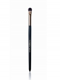 EXCLUSIVELY AT SAKS. A slim stem with natural bristles gathered at the base, tapering slightly at the tip. Perfect for sweeping a single shade from brow to lid or for blending two or more shades with ease. 