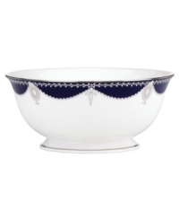 A show-stopping serving bowl from Marchesa by Lenox, this Empire Indigo dinnerware wows everyone around the formal table with a bedazzling platinum pattern in fine bone china.