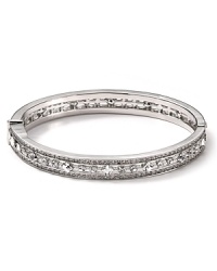 Embellished with delicate crystals, Carolee's hinge bangle is elegantly edgy. Wear this extra with a crisp white blouse to elevate an office look--cuff the sleeves for extra shine.