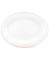 Distinctly ribbed Sophie Conran dinnerware sets your table with the charm of traditional hand-thrown pottery, but the durability of contemporary Portmeirion porcelain. Mix the banded Carnivale platter with solid pink pieces.