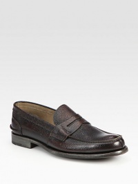 Pebbled calfskin leather in a classic penny loafer design.Leather upperLeather liningWood soleMade in Italy