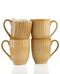 Rustic yet refined, Terre Monte mugs from Gibson are finished with a reactive glaze and dramatic fluted texture. Natural amber tones foster serene everyday meals.