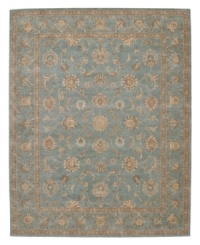 Bring new distinction to your home. Marked by its delicate aqua color palette and luxuriously soft texture, this handcrafted rug recreates the elegance of 17th Century Persian carpets. Hard-twist yarns are specially dyed for a subtlety of coloration producing a vintage look similar to traditional vegetable dyes.