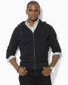 Tonal embroidered details imbue this weathered fleece hoodie with vintage character and athletic style.