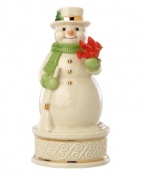 Wishing you a merry Christmas, this porcelain snowman figurine fills your home with song and spirit year after year. Featuring gold buttons, carved accents and a cheery red cardinal in Lenox porcelain. Plays We Wish You a Merry Christmas.