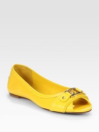 Smooth and vibrant, this leather classic has a logoed goldtone buckle and unexpected peep toe. Leather upperLeather lining and solePadded insoleImportedOUR FIT MODEL RECOMMENDS ordering true size. 