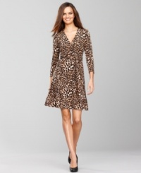 So fabulous! INC's wrap dress features a bold animal print and styling that works for day or night.