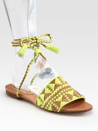 Wondrously woven leather in a vibrant two-tone pattern, topped with tassel ties that wrap around the ankle. Leather upperLeather lining and solePadded insoleImportedOUR FIT MODEL RECOMMENDS ordering true size. 